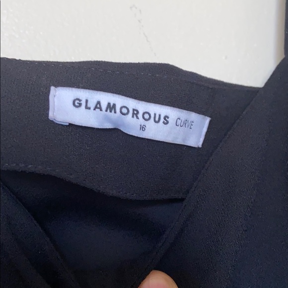 A black Asymmetrical dress. - Picture 5 of 5